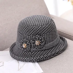 Winter wool bucket hat with houndstooth pattern and floral rhinestone detail