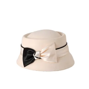 Elegant cream wool dome hat with satin ribbon and black and white bow decoration