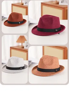 Detailed texture of wool felt fedora hats with grosgrain ribbons and metal badges