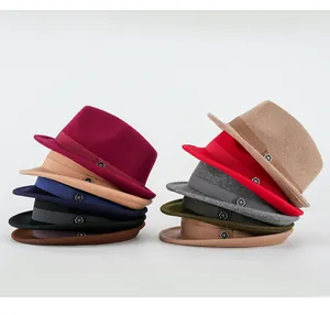 Detailed close-up of wool fedora hats in various colors with ribbon and metal badge