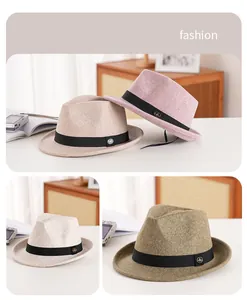 Detail view of stylish wool fedora hats with black ribbons and metallic badge accents