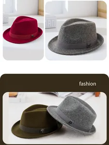 Close-up of wool felt fedora featuring rolled brim and metallic hexagon logo detail