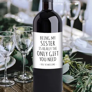 Detailed close-up of creative humor wine bottle labels for sisterhood gift decor