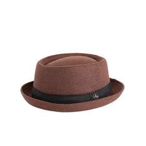 Classic brown wool pork pie hat for men and women with black ribbon and metal accent