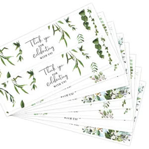 Wedding water bottle labels with green forest leaves and white flowers motif