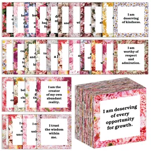 Detailed view of floral affirmation cards with inspirational quotes and thick cardstock quality