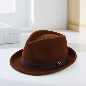 Classic brown wool felt fedora hat with grosgrain ribbon and metal badge detail