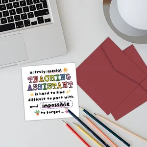 Flat lay of a square thank you card for teaching assistants with envelopes and pencils