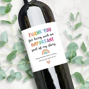 Detail of Thank You wine bottle label with rainbow motif and heart on dark bottle