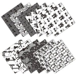 12 sheets of black and white bow and cherry pattern decorative scrapbooking papers