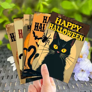 Macro shot of 5 retro Halloween cards featuring black cats and bats in a garden setting