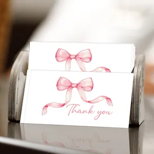 50-pack white thank you cards with pink watercolor bow and elegant cursive script