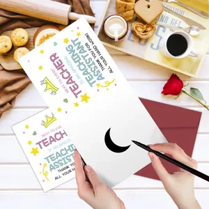 Teacher assistant thank you card with burgundy envelope on a rustic wooden desk