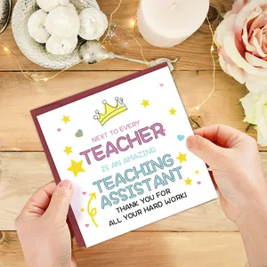 Teacher assistant thank you card with red envelope on a cozy wooden desk setup