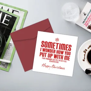 Funny Christmas card with red quote and envelope in a cozy holiday lifestyle setting