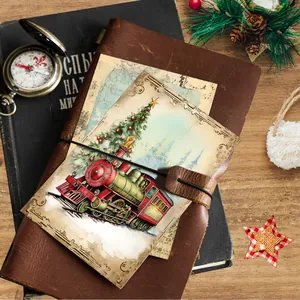 Detail of vintage Christmas wall collage art card featuring a red steam train and festive tree