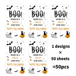 Macro view of Halloween gift tags featuring pumpkins, bats, and spiders for gift wrapping