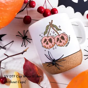 UV DTF cup wrap sticker with pink skull cherries and Halloween themed decor on white mug