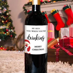 Lustiges Weihnachts-Weinetikett mit Weihnachtsmann und Text He sees you when you are drinking