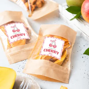 Kraft paper bags with cherry thank you stickers, window display showing dried fruit snacks