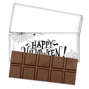 Dettaglio dell'etichetta Happy Halloween per barrette di cioccolato con ragnatele