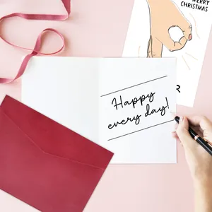 Detailed view of Christmas card interior with Happy every day text and red envelope
