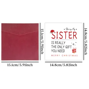 Detailed view of Christmas card and red envelope with precise metric and inch dimensions