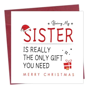Close-up of a funny Christmas card for sister with a red envelope and festive illustrations