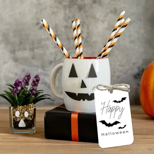 Detail of Halloween gift tag with Happy Halloween text and pumpkin ceramic mug set