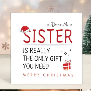 Detail of square Christmas card for sister with festive typography and warm bokeh background