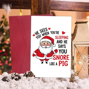 Funny Christmas card with Santa Claus motif including a red envelope and festive decor