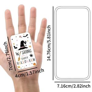 Detailed view of Halloween paper gift tags with pumpkin and bat illustrations and size specs