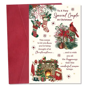 Detail of Christmas greeting card with hand-drawn festive illustrations and red envelope