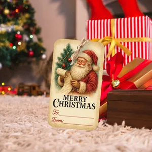 Close-up of vintage Christmas tree tags with Santa Claus motifs and rustic jute twine