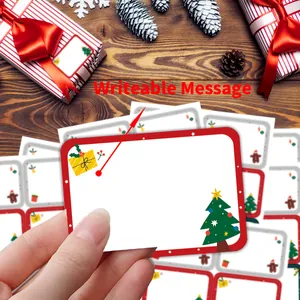 Writable Christmas gift labels with festive tree and gift box designs for holiday packaging