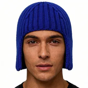 Detail of royal blue knitted ear-protection beanie showing thick knit texture and fit