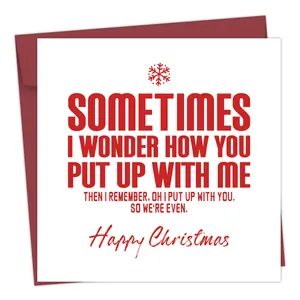 Grappige kerstkaart met humoristische tekst en een bijpassende dieprode envelop
