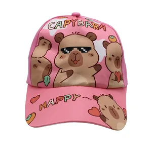 Detailed view of pink capybara cartoon print and HAPPY lettering on child baseball cap