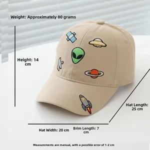 Detail view of beige cotton baseball cap with alien spaceship embroidery and size dimensions