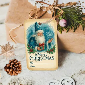 Close-up of vintage kraft paper Christmas gift tags with Santa claus and twine