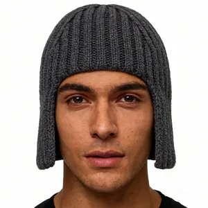 Dark charcoal rib-knit ear flap beanie for winter warmth on a white background