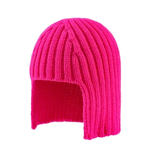 Close-up of hot pink chunky knit ear protection beanie with vertical ribbing texture