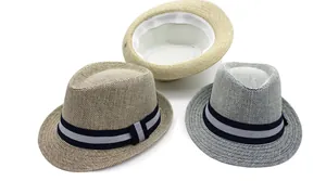 Detailed top view of straw jazz hats in brown, beige, and blue-grey with striped ribbons
