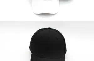 Detailed top view of black and white cotton baseball caps with six-panel construction