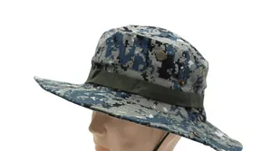 Detailed view of digital camouflage boonie hat with breathable vents and chin strap