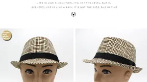 Dettaglio del cappello di paglia intrecciato marrone e bianco con nastro nero classico