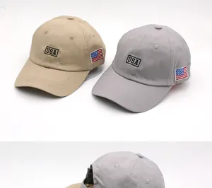Detail of USA embroidery and American flag patch on high-quality cotton baseball caps