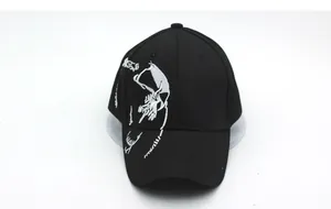 Detail shot of white abstract embroidery on black canvas baseball cap with 6-panel design