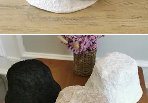 Detail of pleated texture and wide brim on summer sun hats in black, beige and white