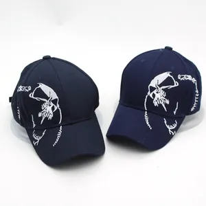 Dark blue baseball cap featuring bold white abstract skull embroidery in a 6-panel design
